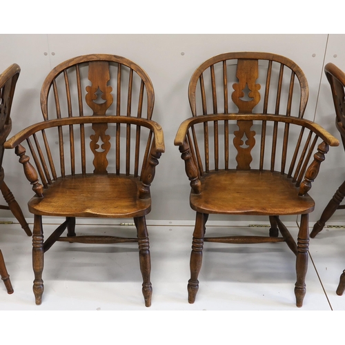 72 - A near set of four 19th century Nottingham area elm, ash and beech Windsor elbow chairs, possibly by... 