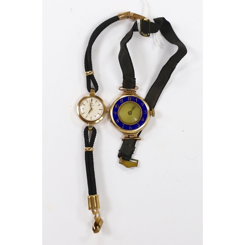 959 - A lady's early 1960's 9ct gold Omega manual wind wrist watch, on a twin strand fabric strap, togethe... 