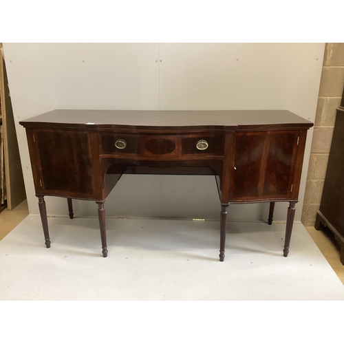 1010 - An Edwardian George III style Maple & Co banded mahogany serpentine sideboard, width 182cm, depth 69... 