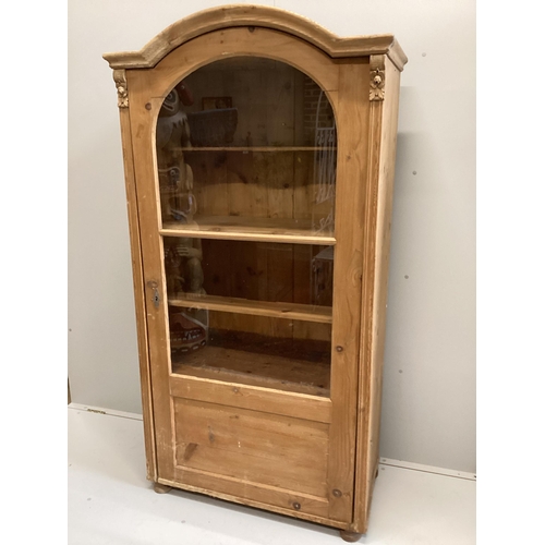 1012 - A 19th century East European glazed pine cabinet, width 95cm, depth 49cm, height 184cm