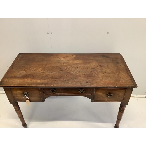 1037 - A Regency mahogany kneehole dressing table, width 106cm, depth 49cm, height 71cm