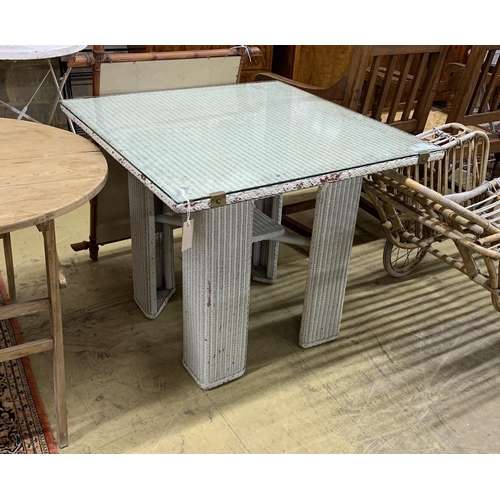 1046 - A vintage Lloyd Loom square table, width 84cm, height 72cm