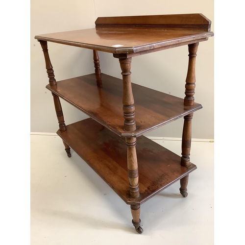 1063 - A late Victorian walnut three tier buffet, width 106cm, depth 51cm, height 107cm