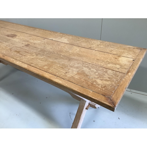 1064 - An 18th century style rectangular bleached oak tavern table, length 205cm, width 67cm, height 74cm... 