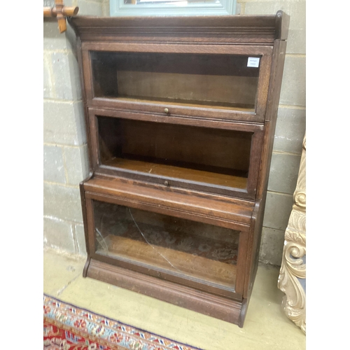 1083 - A Globe Wernicke style oak three section bookcase, width 87cm, depth 44cm, height 130cm