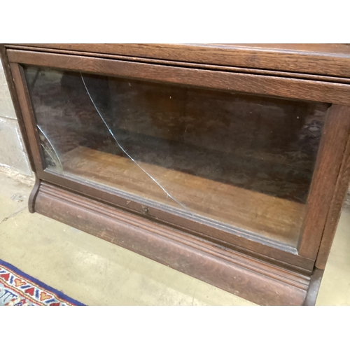 1083 - A Globe Wernicke style oak three section bookcase, width 87cm, depth 44cm, height 130cm