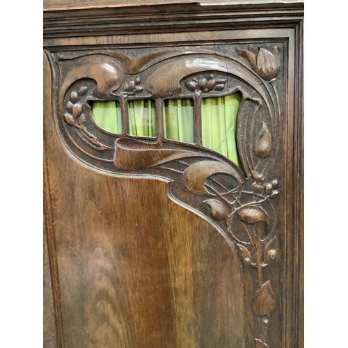 1086 - A late 19th century French Art Nouveau carved oak compactum wardrobe, width 205cm, depth 64cm, heigh... 