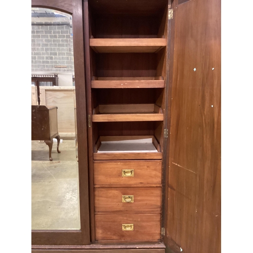 1086 - A late 19th century French Art Nouveau carved oak compactum wardrobe, width 205cm, depth 64cm, heigh... 