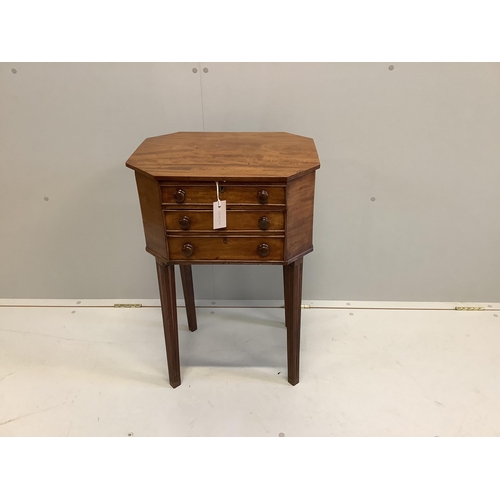 1106 - A George III octagonal mahogany hinged top work table, width 49cm, depth 39cm, height 73cm