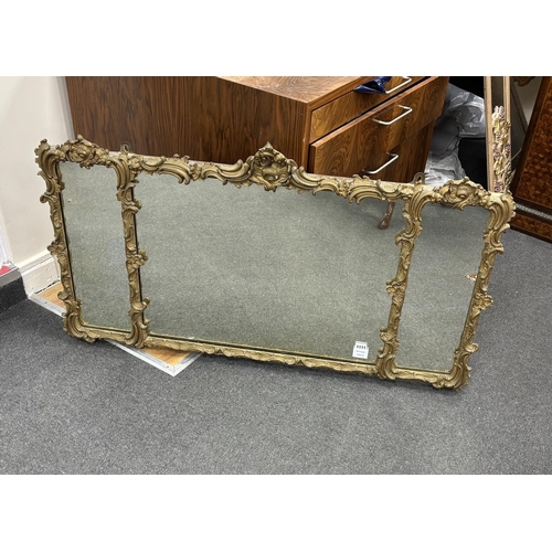 1111 - A giltwood and composition triple plate overmantel mirror, width 115cm, height 66cm