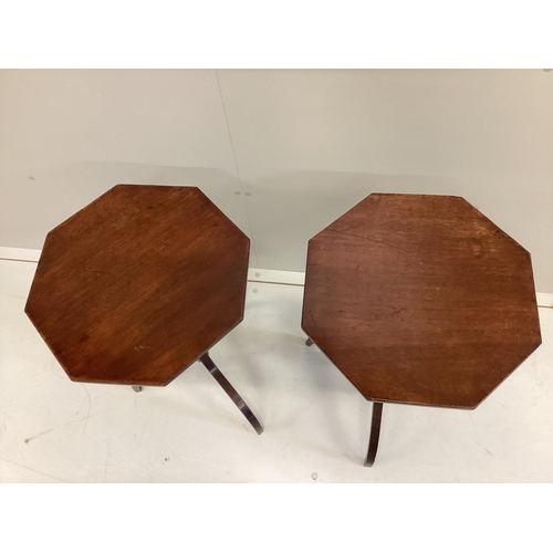 1119 - A pair of Regency style octagonal mahogany tripod wine tables, width 40cm, height 72cm