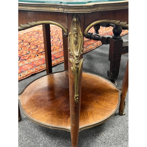 1123 - A Louis XVI style gilt metal mounted circular mahogany two tier occasional table, diameter 61cm, hei... 