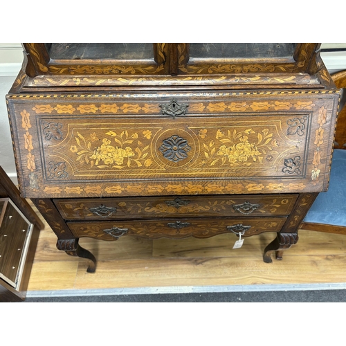 1127 - An early 19th century and later Dutch oak and walnut floral marquetry inlaid bureau bookcase, width ... 