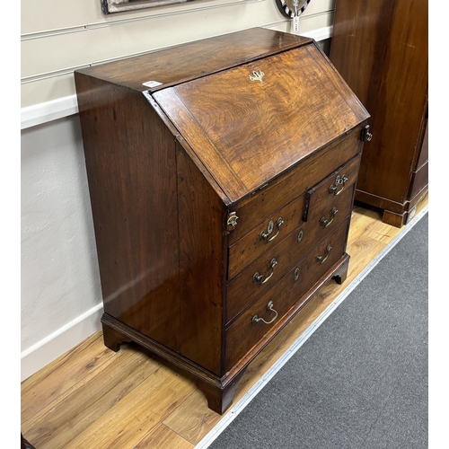 1130 - A George III red walnut bureau, width 84cm, depth 51cm, height 95cm