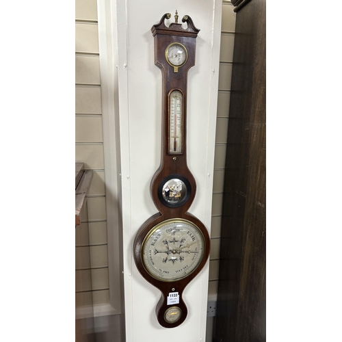 1133 - An early 19th century mahogany wheel barometer by Reynoldson of Hull, height 96cm