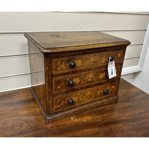 1138 - A Victorian floral marquetry inlaid miniature walnut chest, stamped 1863, B Shepherd, width 35cm, de... 