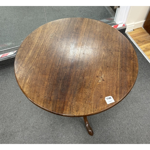 1140 - A George III circular mahogany tilt top tripod tea table, width 76cm, height 72cm