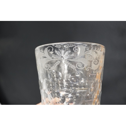 1258 - An English lead crystal 18th century faceted tumbler, in a darkish grey metal, upper decoration engr... 