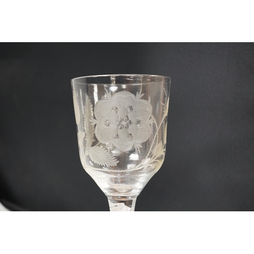 1260 - An English lead crystal Jacobite goblet, c.1750-60, bowl of ogee form, engraved with open and one cl... 