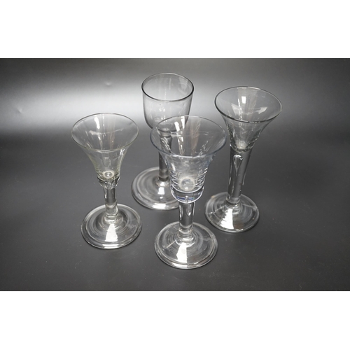 1264 - A group of four Georgian wine glasses, c.1740-50, tallest 16.8cm