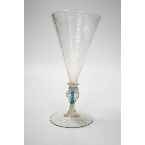 1268 - A Facon de Venise wine glass, c.1800, the round funnel bowl is spiral moulded over a blade knop, rou... 