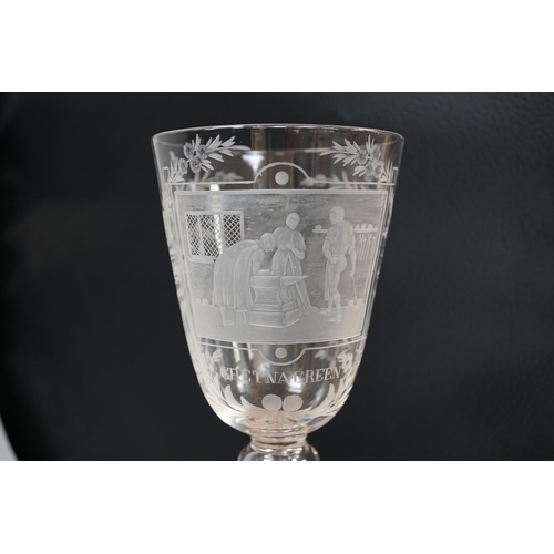 1269 - A lead crystal commemorative Gretna Green goblet, with fine engraving of a blacksmith and couple sig... 