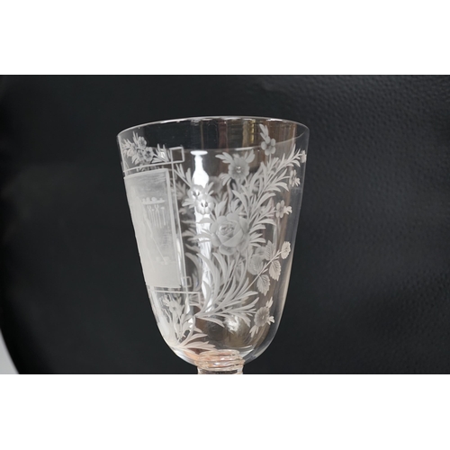 1269 - A lead crystal commemorative Gretna Green goblet, with fine engraving of a blacksmith and couple sig... 