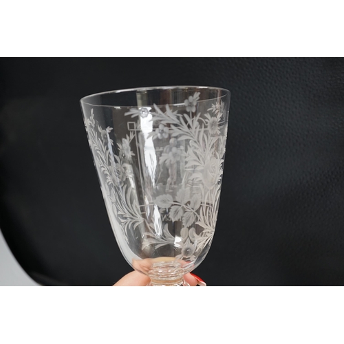 1269 - A lead crystal commemorative Gretna Green goblet, with fine engraving of a blacksmith and couple sig... 