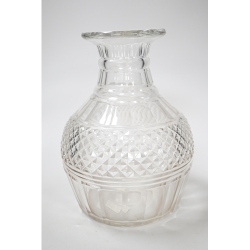 1270 - An English lead crystal Regency carafe, three rows of square cut facets alternate with two cut rings... 