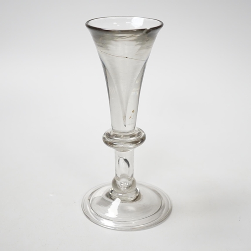 1271 - An English lead crystal baluster toastmasters glass, c.1710-20, elongated trumpet deceptive bowl on... 