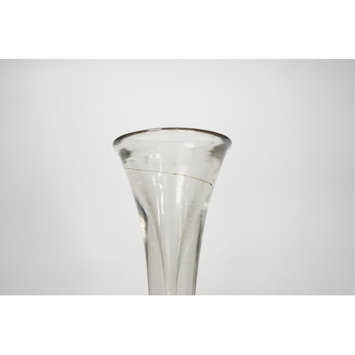 1271 - An English lead crystal baluster toastmasters glass, c.1710-20, elongated trumpet deceptive bowl on... 