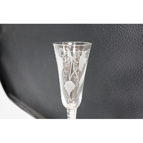 1279 - An English lead crystal DSOT ale glass, c.1760, elongated round funnel bowl finely engraved with hop... 