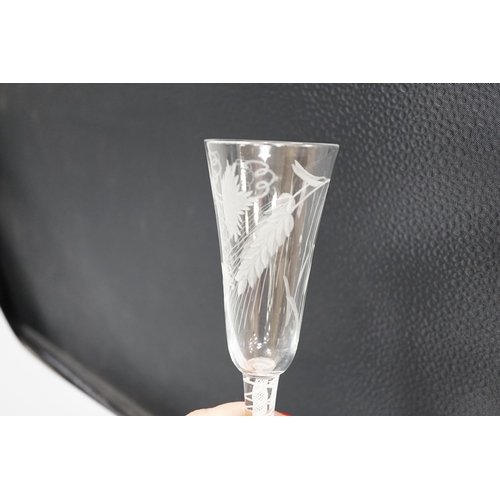 1279 - An English lead crystal DSOT ale glass, c.1760, elongated round funnel bowl finely engraved with hop... 