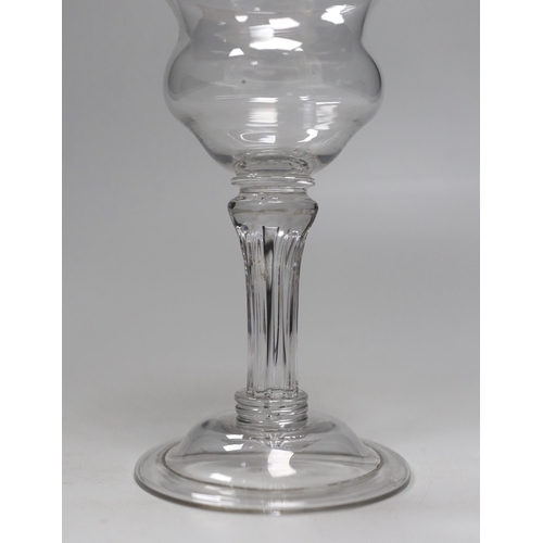 1288 - An English lead crystal champagne or sweetmeat glass c.1740, with double ogee bowl, with collar unde... 