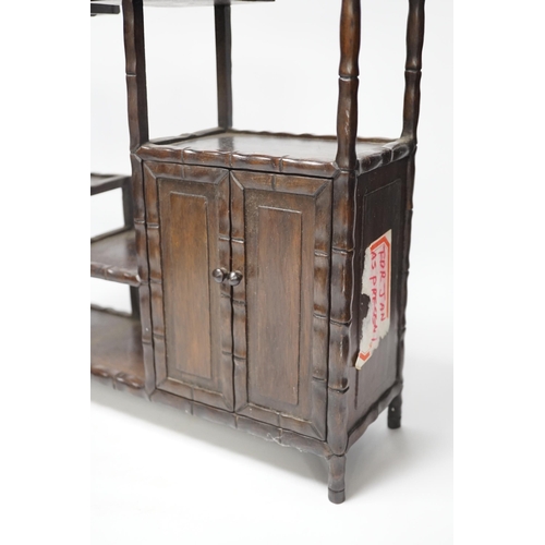 1314 - An early 20th century Chinese hongmu display shelf with cupboard and drawer, 46cm high