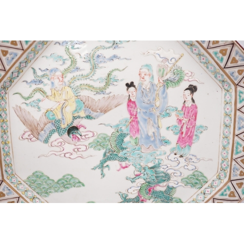 1316 - A Japanese porcelain octagonal dish enamelled with figures, dragon and bird, Meiji period, 36cm high... 