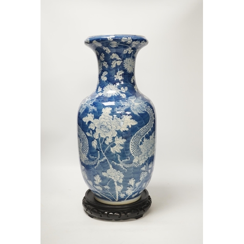 1317 - A Chinese blue and white baluster vase decorated with dragons and flowers together with an unassocia... 