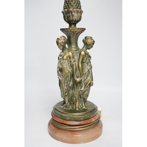 1320 - A Three Graces painted resin table lamp, partially gilded, raised on circular rouge marble base, 51c... 