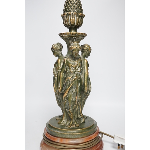 1320 - A Three Graces painted resin table lamp, partially gilded, raised on circular rouge marble base, 51c... 