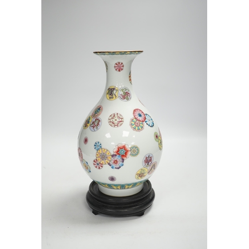 1333 - A Chinese famille rose vase, on hardwood stand, overall 27cm high