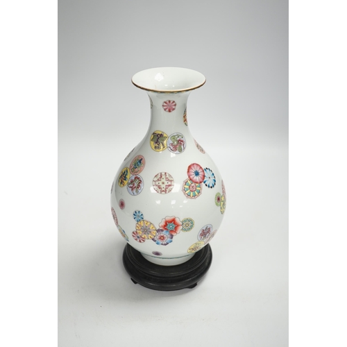 1333 - A Chinese famille rose vase, on hardwood stand, overall 27cm high