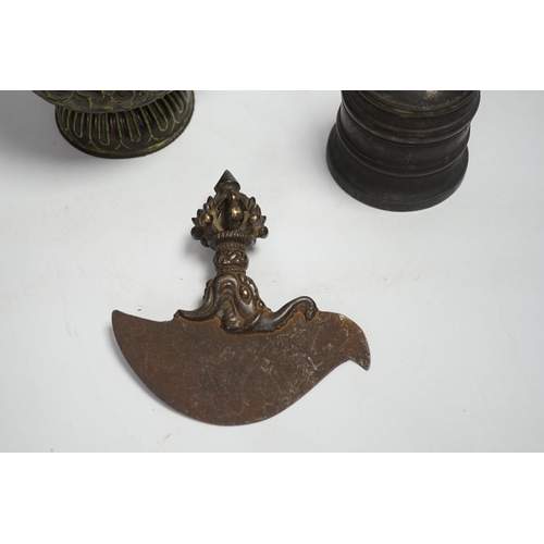 1339 - A Tibetan repousse teapot, a ghanta bell and a kartika chopper, tallest 19cm