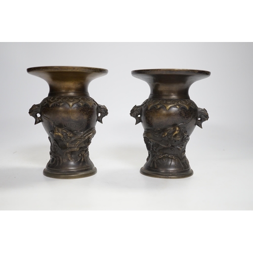 1342 - A pair of small Japanese bronze 'dragon' vases, 12.5cm