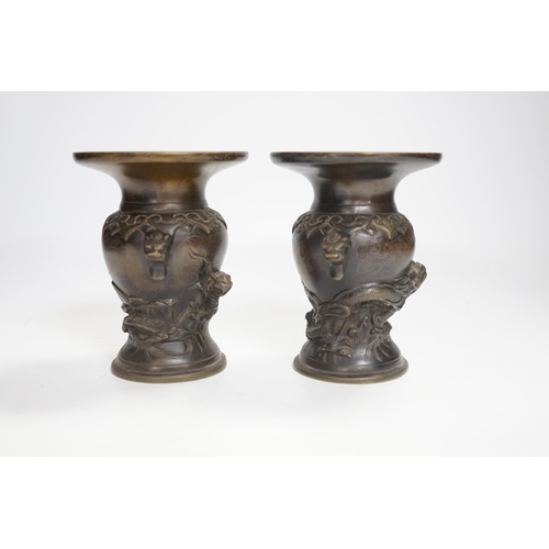 1342 - A pair of small Japanese bronze 'dragon' vases, 12.5cm