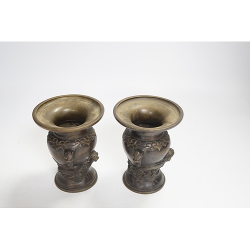 1342 - A pair of small Japanese bronze 'dragon' vases, 12.5cm