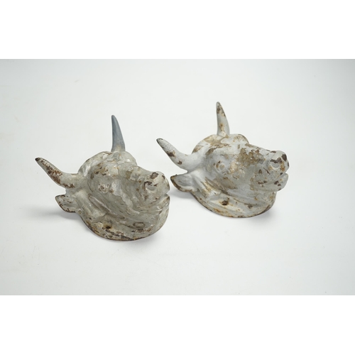 1346 - A pair of cast iron bulls head mounts, 13.5cm