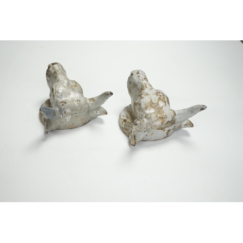 1346 - A pair of cast iron bulls head mounts, 13.5cm