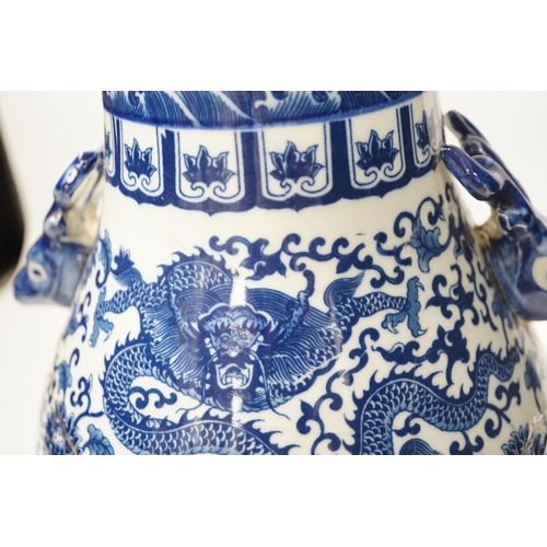 1352 - A Chinese blue and white hu vase with deer head handles, 29.5cm