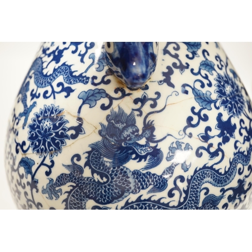 1352 - A Chinese blue and white hu vase with deer head handles, 29.5cm