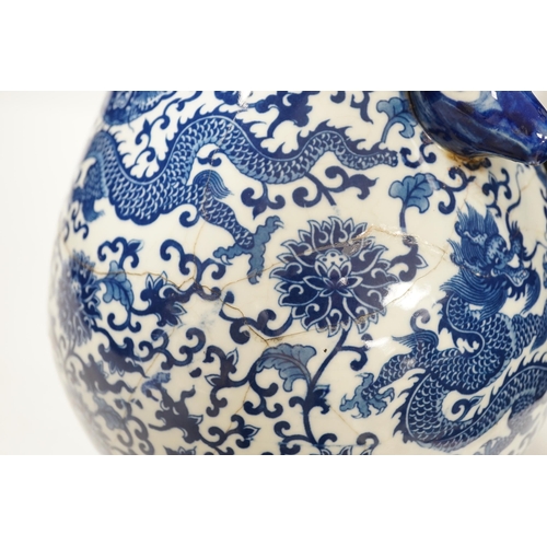 1352 - A Chinese blue and white hu vase with deer head handles, 29.5cm